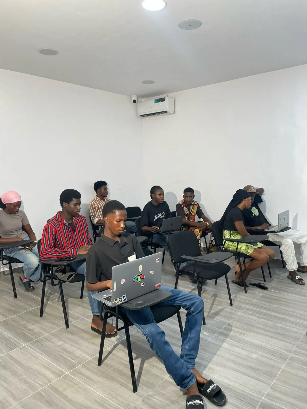 Learners working on laptops during a class at EduRepublic